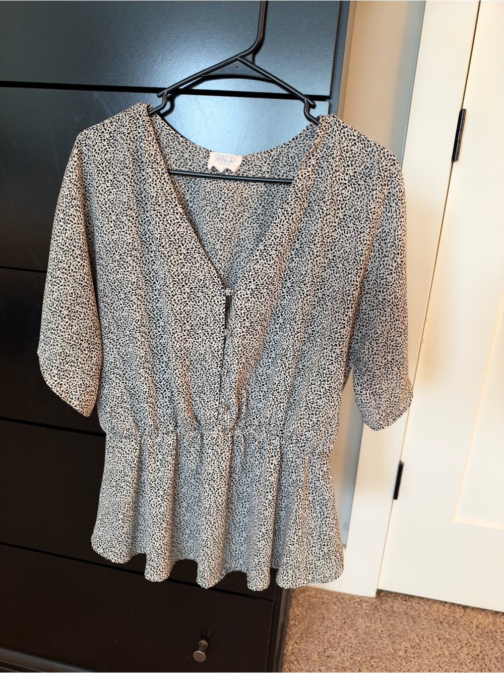 Sienna Sky Black and White V-Neck Peplum Blouse